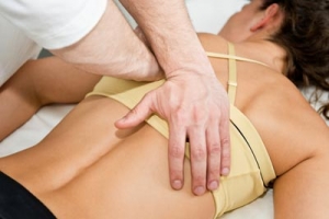 Chiropractor treating patient